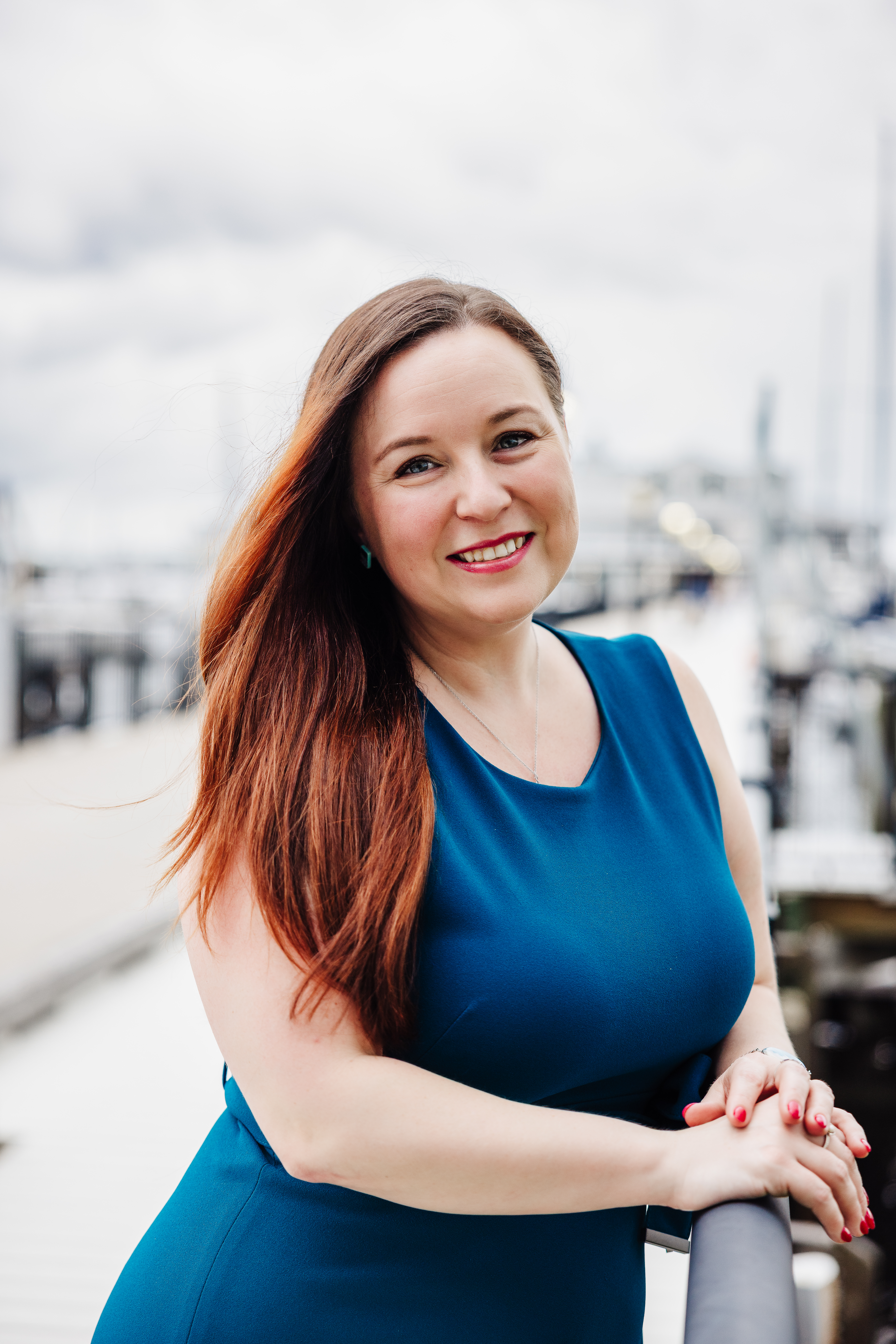 Ashley Craft, CPA Picture of Ashley Craft, a licensed CPA in Bradenton FL with boat docks in the background